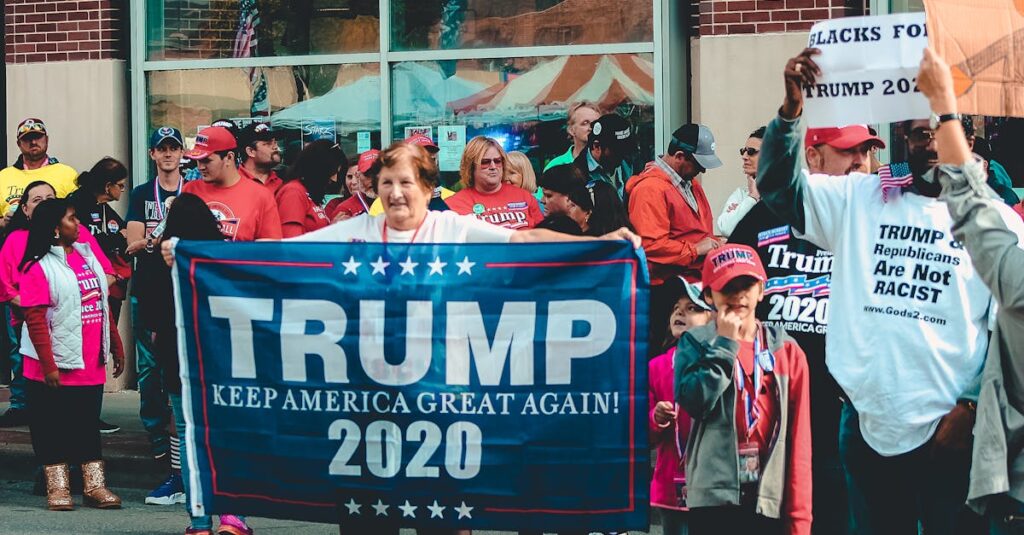 A crowded political rally in Wheeling, showcasing Trump supporters with banners and signs.
